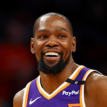 Mar 24, 2025; Phoenix, Arizona, USA; Phoenix Suns forward Kevin Durant (35) celebrates after a play during the fourth quarter against the Milwaukee Bucks at Footprint Center. Mandatory Credit: Mark J. Rebilas-Imagn Images