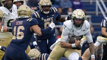 Nov 15, 2025; Annapolis, Maryland, USA;  South Florida Bulls quarterback Byrum Brown (17) scrambles through the Navy Midshipmen defense during the second half at Navy-Marine Corps Memorial Stadium. Navy Midshipmen defeated South Florida Bulls 41-28. Mandatory Credit: Tommy Gilligan-Imagn Images