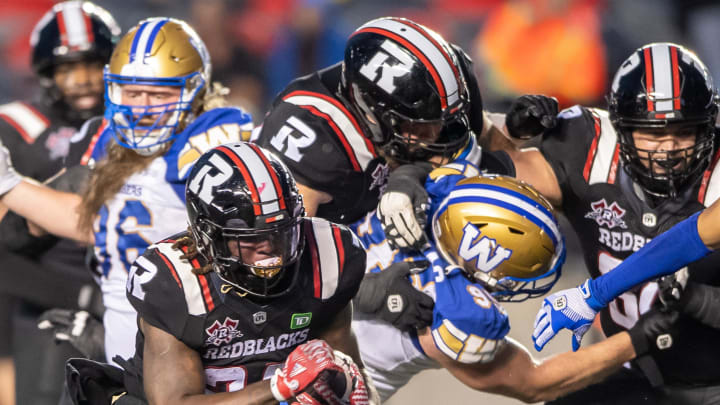 Jun 13, 2024; Ottawa, Ontario, CAN; Ottawa REDBLACKS running back Ryquell Armstead (25) runs the ball in the first half against the Winnipeg Blue Bombers at TD Place. Mandatory Credit: Marc DesRosiers-USA TODAY Sports