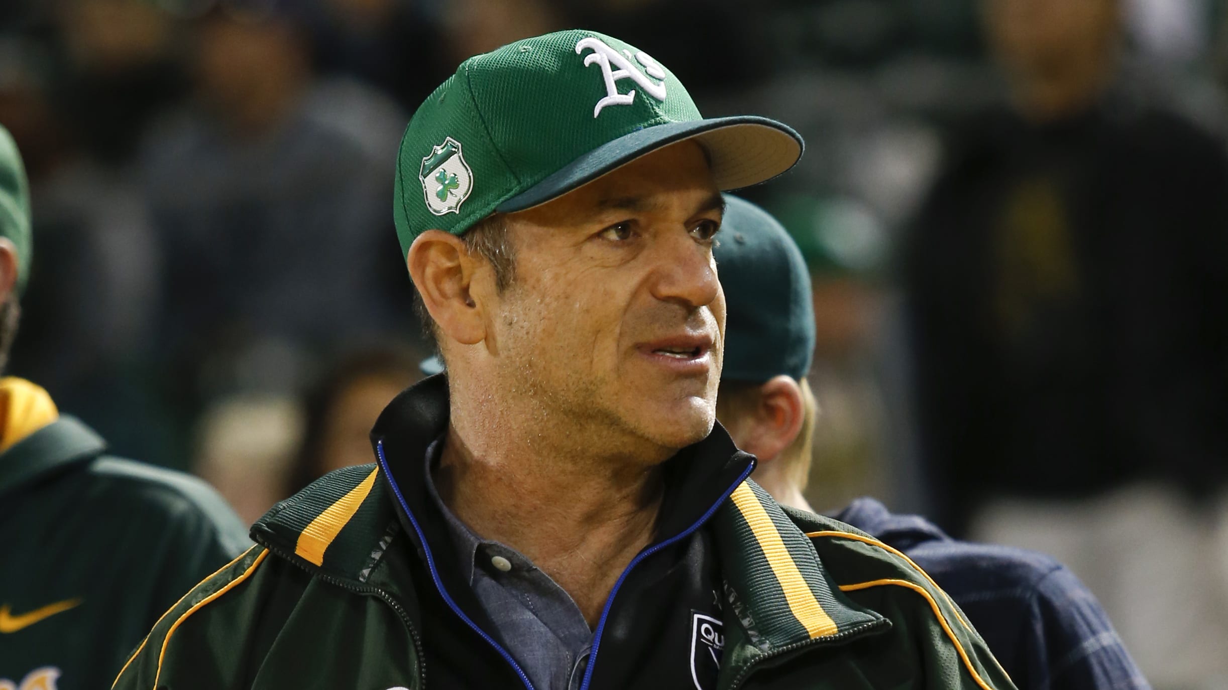 John Fisher and David Kaval watch an A's game