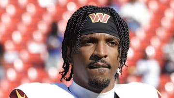 Washington Commanders quarterback Jayden Daniels walks off the field after the game against the New York Giants.