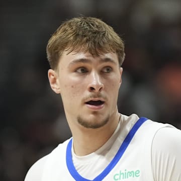 Jul 10, 2025; Las Vegas, NV, USA; Dallas Mavericks forward Cooper Flagg (32) looks on in the first quarter of the game against the Los Angeles Lakers at Thomas & Mack Center. Mandatory Credit: Candice Ward-Imagn Images