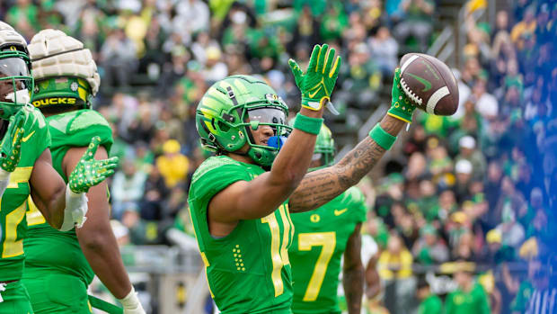 Oregon Green Team wide receiver Justius Lowe celebrates a touchdown during the Oregon Ducks’ Spring Game Saturday, April 27. 