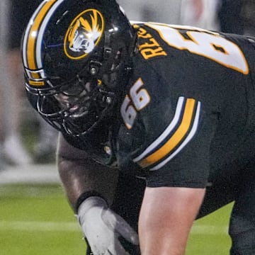 Aug 29, 2024; Columbia, Missouri, USA; Missouri Tigers offensive lineman Logan Reichert (66) on the line of scrimmage against the Murray State Racers during the game at Faurot Field at Memorial Stadium. Mandatory Credit: Denny Medley-Imagn Images