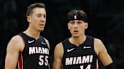Oct 27, 2023; Boston, Massachusetts, USA; Miami Heat forward Duncan Robinson (55) and guard Tyler Herro (14) during the second half against the Boston Celtics at TD Garden. Mandatory Credit: Winslow Townson-Imagn Images