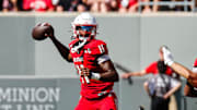 Oct 4, 2025; Raleigh, North Carolina, USA; NC State Wolfpack quarterback CJ Bailey (11) prepares to throw the ball during the first half of the game against Campbell Fighting Camels at Carter-Finley Stadium. Mandatory Credit: Jaylynn Nash-Imagn Images