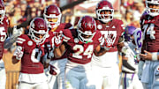 Mississippi State Bulldogs running back Fluff Bothwell (24) celebrates with teammates after a touchdown during the first quarter against the Alcorn State Braves at Davis Wade Stadium at Scott Field. 