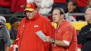Oct 12, 2023; Kansas City, Missouri, USA; Kansas City Chiefs head coach Andy Reid and defensive coordinator Steve Spagnuolo talk on the sidelines against the Denver Broncos during the game at GEHA Field at Arrowhead Stadium. Mandatory Credit: Denny Medley-Imagn Images