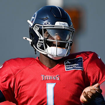 Tennessee Titans quarterback Cam Ward throws the ball during an NFL football training camp practice.