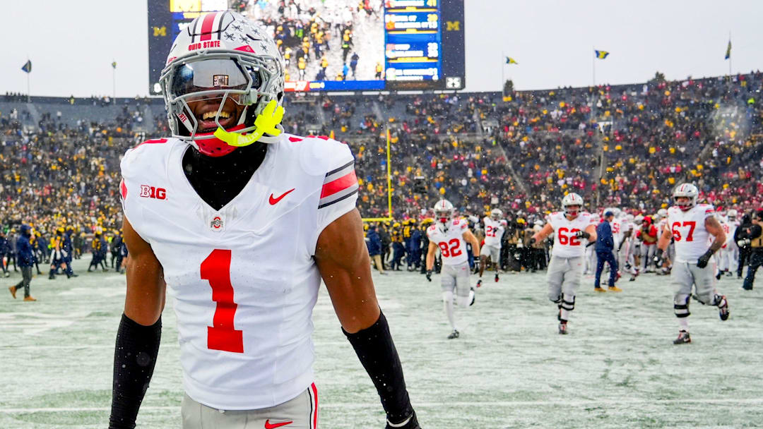 Ohio State Buckeyes cornerback Davison Igbinosun (1) celebrates after defeating the Michigan Wolverines in the NCAA football game at Michigan Stadium on Saturday, Nov. 29, 2025 in Ann Arbor, Michigan. Ohio State Buckeyes cornerback Davison Igbinosun (1) celebrates after defeating the Michigan Wolverines in the NCAA football game at Michigan Stadium on Saturday, Nov. 29, 2025 in Ann Arbor, Michigan.