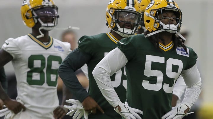 Green Bay Packers linebacker Ty'Ron Hopper (59) warms up during rookie minicamp on Friday, May 3, 2024, at the Don Hutson Center in Green Bay, Wis. 
Tork Mason/USA TODAY NETWORK-Wisconsin