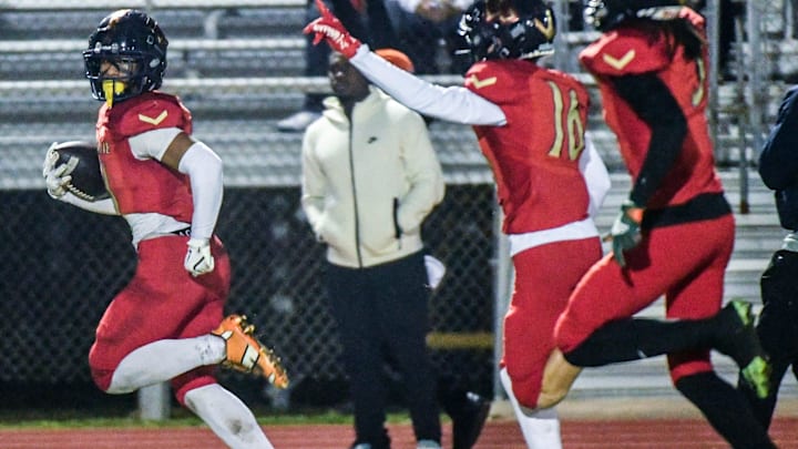 Xavier Lherisse of Eau Gallie returns a Titusville punt for a touchdown in the FHSAA Class 3A football regional semifinal Friday, November 22, 2024. Craig Bailey/FLORIDA TODAY via USA TODAY NETWORK
