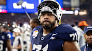 Dec 31, 2024; Glendale, AZ, USA; Penn State Nittany Lions offensive lineman Olaivavega Ioane (71) against the Boise State Broncos during the Fiesta Bowl at State Farm Stadium