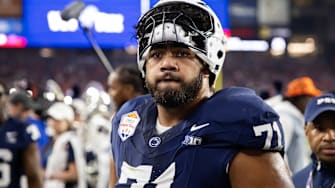 Dec 31, 2024; Glendale, AZ, USA; Penn State Nittany Lions offensive lineman Olaivavega Ioane (71) against the Boise State Broncos during the Fiesta Bowl at State Farm Stadium