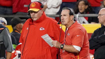Oct 12, 2023; Kansas City, Missouri, USA; Kansas City Chiefs head coach Andy Reid and defensive coordinator Steve Spagnuolo talk on the sidelines against the Denver Broncos during the game at GEHA Field at Arrowhead Stadium. Mandatory Credit: Denny Medley-USA TODAY Sports