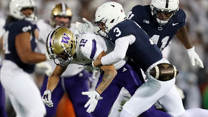 Nov 9, 2024; University Park, Pennsylvania, USA; Penn State Nittany Lions cornerback Jalen Kimber (3) breaks up a pass intended for Washington Huskies wide receiver Denzel Boston (12) during the first quarter at Beaver Stadium. Penn State won 35-6. Mandatory Credit: Matthew O'Haren-Imagn Images
