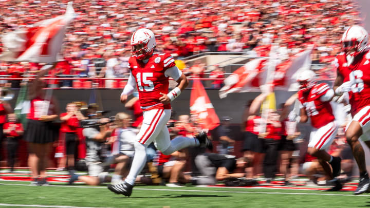 Aug 31, 2024; Lincoln, Nebraska, USA; Nebraska Cornhuskers quarterback Dylan Raiola (15) runs onto the field before a game against the UTEP Miners at Memorial Stadium.