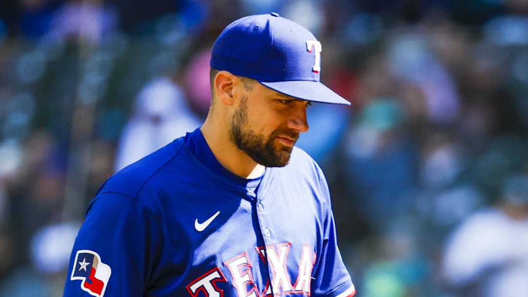 Apr 13, 2025; Seattle, Washington, USA; Texas Rangers pitcher Nathan Eovaldi (17) walks to the dugout during a sixth inning pitching change against the Seattle Mariners at T-Mobile Park Apr 13, 2025; Seattle, Washington, USA; Texas Rangers pitcher Nathan Eovaldi (17) walks to the dugout during a sixth inning pitching change against the Seattle Mariners at T-Mobile Park