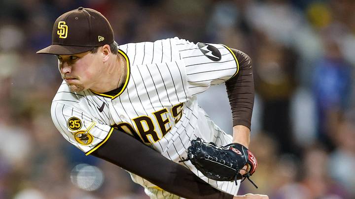 Jun 6, 2026; San Diego, California, USA; San Diego Padres relief pitcher Mason Miller (22) throws a pitch during the ninth inning against the New York Mets at Petco Park. Mandatory Credit: David Frerker-Imagn Images