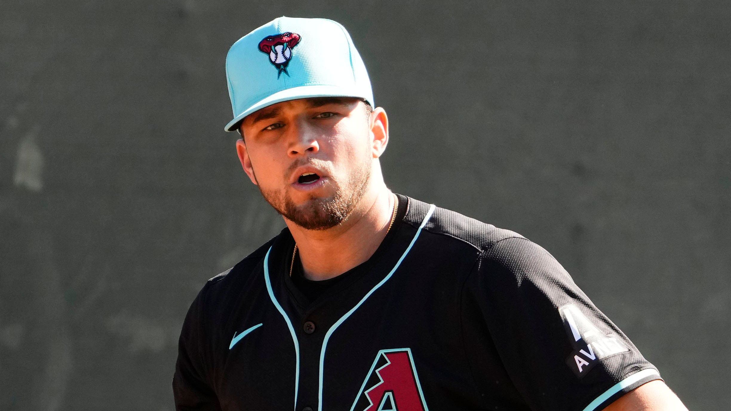 Arizona Diamondbacks right-handed pitcher Slade Cecconi (43) throws a bullpen at Salt River Fields.