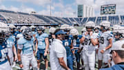 FIU football head coach Willie Simmons with his team during the spring game