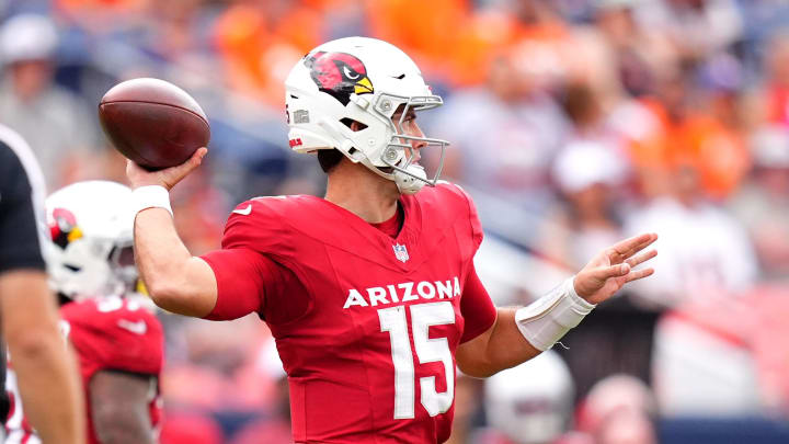 Aug 25, 2024; Denver, Colorado, USA; Arizona Cardinals quarterback Clayton Tune (15) prepares to pass the ball in the first quarter against the Denver Broncos at Empower Field at Mile High. Mandatory Credit: Ron Chenoy-USA TODAY Sports