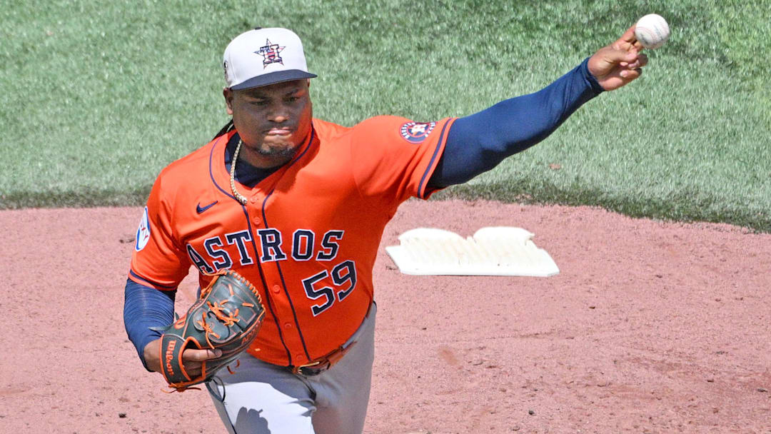 Houston Astros starting pitcher Framber Valdez (59) delivers a pitch against the Toronto Blue Jays.