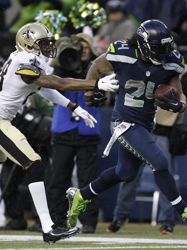 Seattle Seahawks running back Marshawn Lynch (24) and Saints cornerback Keenan Lewis (28)