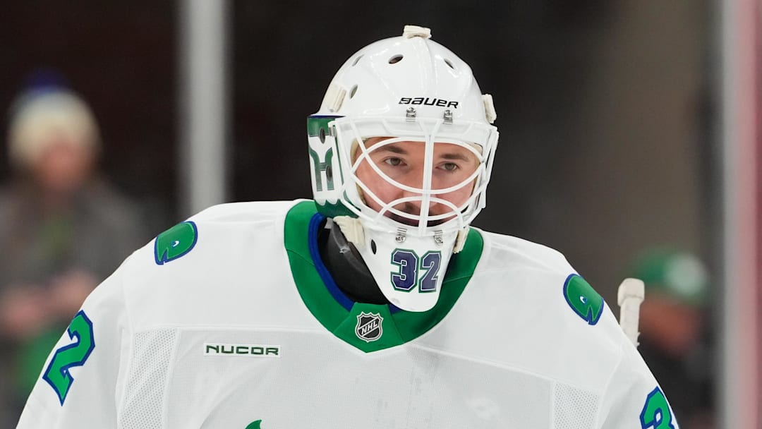 Jan 29, 2026; Raleigh, North Carolina, USA;  Carolina Hurricanes goaltender Brandon Bussi (32) looks on during the warmups before the game against the Utah Mammoth at Lenovo Center. Mandatory Credit: James Guillory-Imagn Images