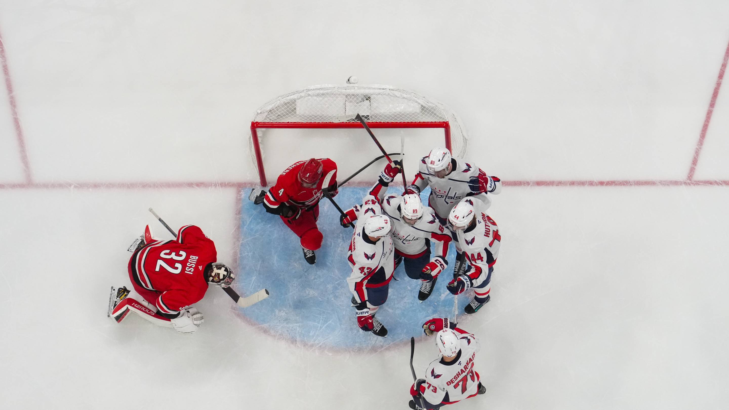 Caps beat Canes in Season opener