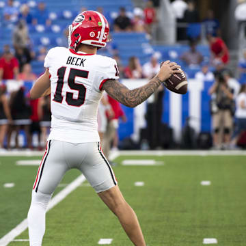 Sep 14, 2024; Lexington, Kentucky, USA; Georgia Bulldogs quarterback Carson Beck (15) warms up before the game against the Kentucky Wildcats at Kroger Field. Mandatory Credit: Tanner Pearson-Imagn Images