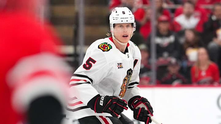 Blackhawks defenseman Connor Murphy (5) watches the play against the Carolina Hurricanes during the second period at Lenovo Center. Mandatory Credit: James Guillory-Imagn Images