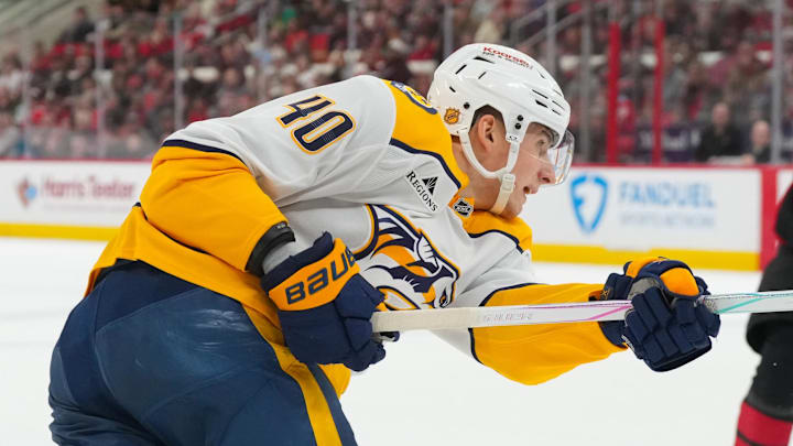 Dec 6, 2025; Raleigh, North Carolina, USA;  Nashville Predators center Fedor Svechkov (40) takes a shot aCarolina Hurricanes during the second period at Lenovo Center. Mandatory Credit: James Guillory-Imagn Images