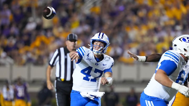 Sep 20, 2025; Greenville, North Carolina, USA;  Brigham Young Cougars quarterback Bear Bachmeier (47) throws the ball against the East Carolina Pirates during the second half at Dowdy-Ficklen Stadium. Mandatory Credit: James Guillory-Imagn Images