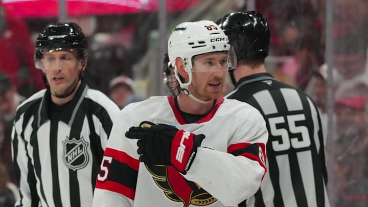 Apr 18, 2026; Raleigh, North Carolina, USA; Ottawa Senators defenseman Jake Sanderson (85) reacts against the Carolina Hurricanes during the third period in game one of the first round of the 2026 Stanley Cup Playoffs at Lenovo Center. Mandatory Credit: James Guillory-Imagn Images