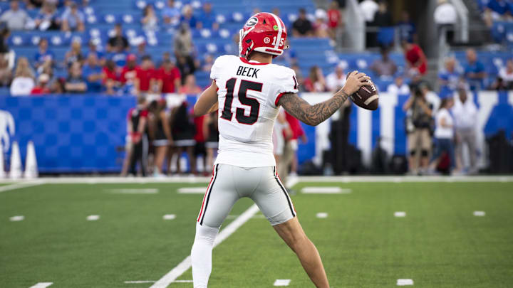 Sep 14, 2024; Lexington, Kentucky, USA; Georgia Bulldogs quarterback Carson Beck (15) warms up before the game against the Kentucky Wildcats at Kroger Field. Mandatory Credit: Tanner Pearson-Imagn Images