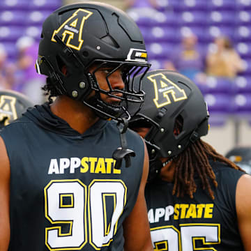 Sep 14, 2024; Greenville, North Carolina, USA;  Appalachian State Mountaineers linebacker Nate Johnson (90) looks on before the game during the warmups against the East Carolina Pirates at Dowdy-Ficklen Stadium. Mandatory Credit: James Guillory-Imagn Images
