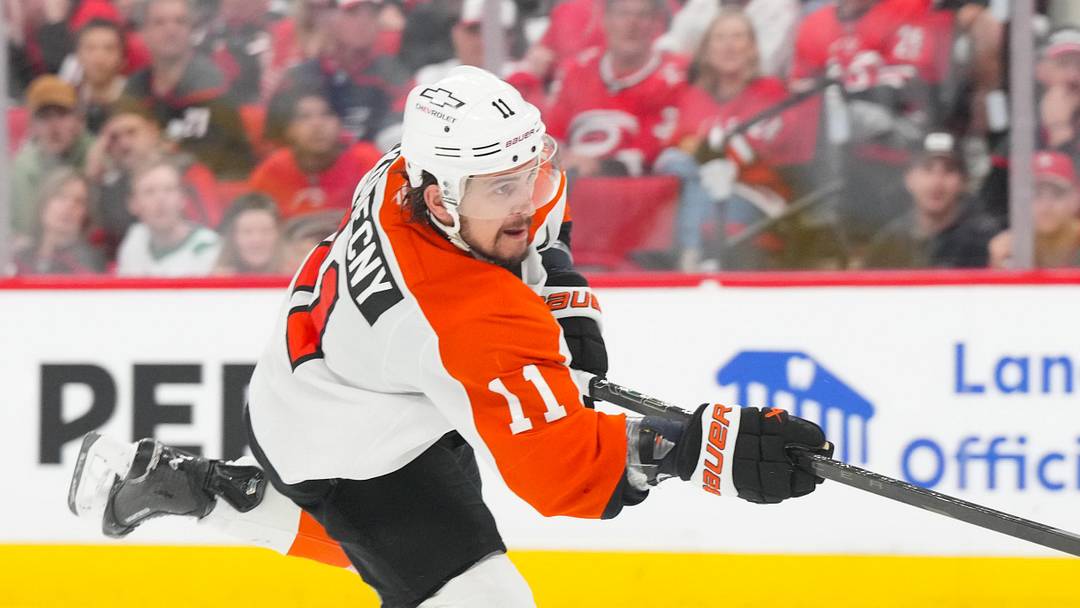 May 4, 2026; Raleigh, North Carolina, USA; Philadelphia Flyers right wing Travis Konecny (11) takes a shot against the Carolina Hurricanes in the first overtime in game two of the second round of the 2026 Stanley Cup Playoffs at Lenovo Center. 
