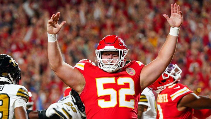 Oct 7, 2024; Kansas City, Missouri, USA; Kansas City Chiefs center Creed Humphrey (52) celebrates after a score against the New Orleans Saints during the first half at GEHA Field at Arrowhead Stadium. Mandatory Credit: Denny Medley-Imagn Images