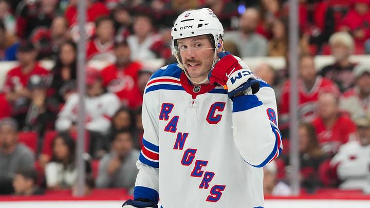 Nov 26, 2025; Raleigh, North Carolina, USA; New York Rangers center J.T. Miller (8) reacts against the Carolina Hurricanes during the third period at Lenovo Center. Mandatory Credit: James Guillory-Imagn Images