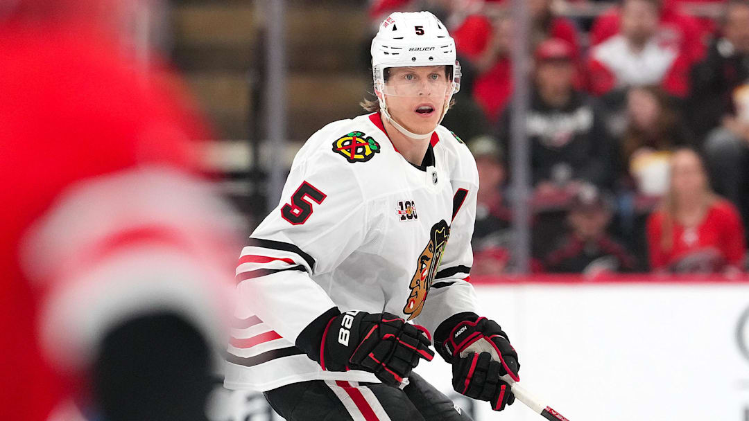 Jan 22, 2026; Raleigh, North Carolina, USA;  Chicago Blackhawks defenseman Connor Murphy (5) watches the play against the Carolina Hurricanes during the second period at Lenovo Center. Mandatory Credit: James Guillory-Imagn Images