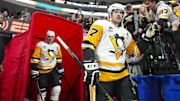 Nov 18, 2023; Raleigh, North Carolina, USA; Pittsburgh Penguins center Sidney Crosby (87) and center Evgeni Malkin (71) come out of the locker room for the warmups Carolina Hurricanes at PNC Arena. Mandatory Credit: James Guillory-Imagn Images