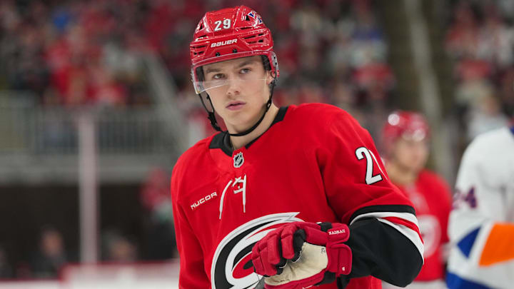 Oct 30, 2025; Raleigh, North Carolina, USA;  Carolina Hurricanes left wing Bradly Nadeau (29) looks on against the New York Islanders during the third period at Lenovo Center. Mandatory Credit: James Guillory-Imagn Images