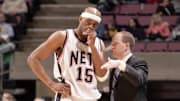 Jan 19, 2005; East Rutherford, NJ, USA; New Jersey Nets forward Vince Carter (15) on the sideline with coach Lawrence Frank during their game against the Milwaukee Bucks at Continental Airlines Arena. Credit: Lou Capozzola-USA TODAY NETWORK