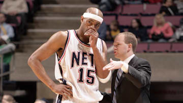 Jan 19, 2005; East Rutherford, NJ, USA; New Jersey Nets forward Vince Carter (15) on the sideline with coach Lawrence Frank during their game against the Milwaukee Bucks at Continental Airlines Arena. Credit: Lou Capozzola-USA TODAY NETWORK