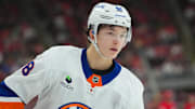 Oct 30, 2025; Raleigh, North Carolina, USA;  New York Islanders defenseman Matthew Schaefer (48) watches the play against the Carolina Hurricanes during the third period at Lenovo Center. Mandatory Credit: James Guillory-Imagn Images