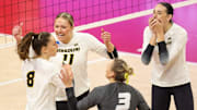 Missouri players celebrate a point against Delaware during the third set of an NCAA women's college volleyball tournament first-round match Friday, Dec. 1, 2023, in Lincoln, Neb. (Nikos Frazier/Omaha World-Herald via AP)