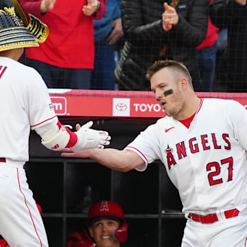 May 24, 2023; Anaheim, California, USA; Los Angeles Angels designated hitter Shohei Ohtani (17) is congratulated by center fielder Mike Trout (27) after hitting a home run against the Boston Red Sox in the second inning at Angel Stadium. Mandatory Credit: Kirby Lee-Imagn Images