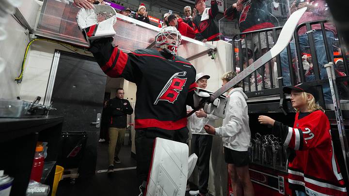 May 4, 2026; Raleigh, North Carolina, USA; Carolina Hurricanes goaltender Brandon Bussi (32) comes out of the locker room for the warmups before the game against the Philadelphia Flyers in game two of the second round of the 2026 Stanley Cup Playoffs at Lenovo Center. Mandatory Credit: James Guillory-Imagn Images
