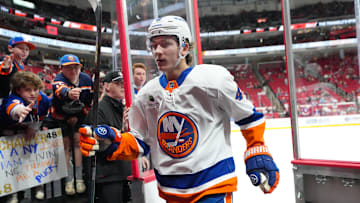 Oct 30, 2025; Raleigh, North Carolina, USA;  New York Islanders defenseman Matthew Schaefer (48) goes past the fans on his way off the ice after the warmups before the game against the Carolina Hurricanes at Lenovo Center. Mandatory Credit: James Guillory-Imagn Images